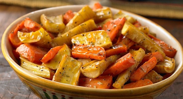 Parsnips pair well with carrots offering contrasting color, texture and tastes. Rosemary and other herbs enhance teh flavors.