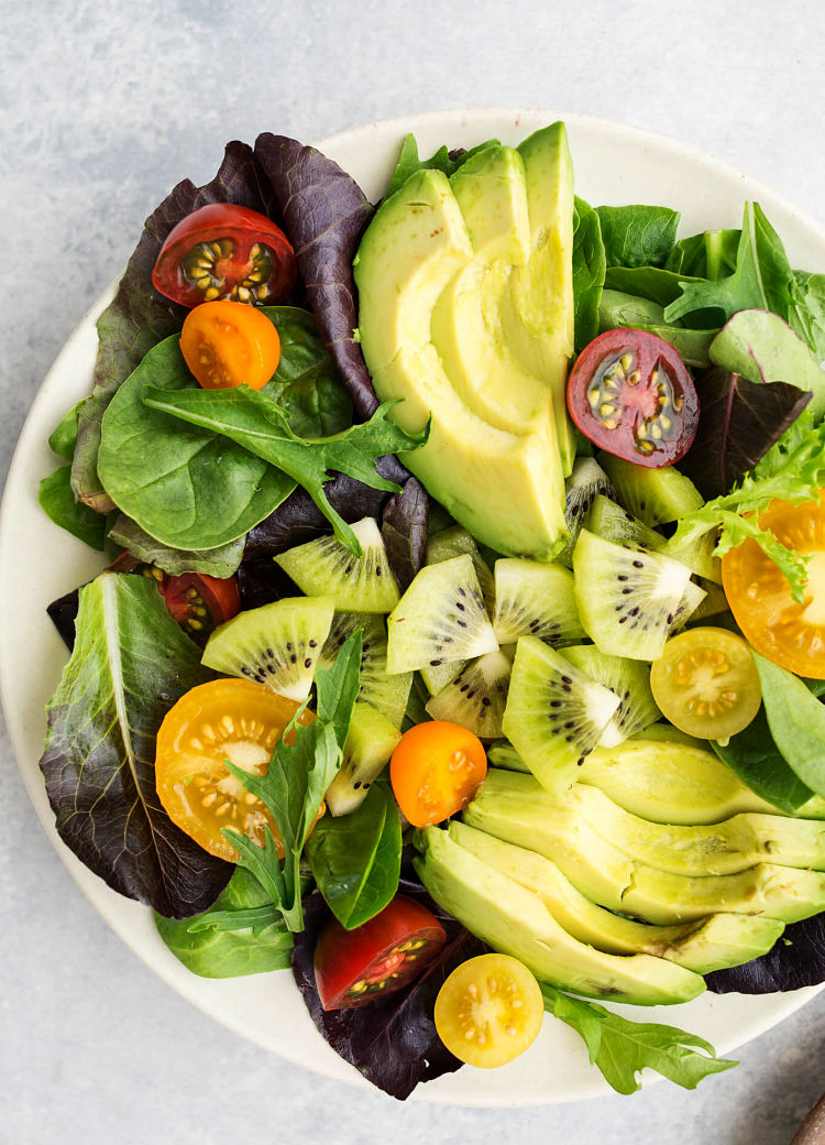 Bright, fresh, and easy, this Kiwi Avocado and Tomato Salad recipe is a delight, showcasing the delights of kiwi fruit
